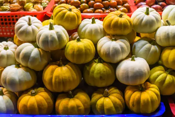 Photo of Pumkin vegetable in a row in the night market as a autumn harvest