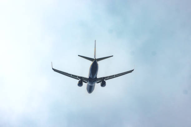 Plane ahead May 2023- Eindhoven, The Netherlands: Plane flying over after take off from Eindhoven Airport airbus a320 stock pictures, royalty-free photos & images