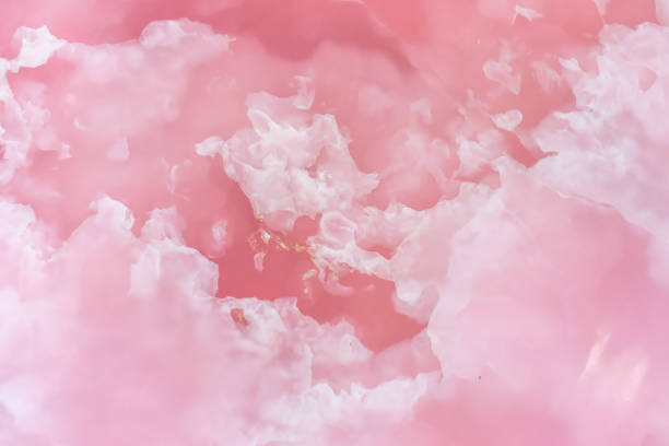 istock Light pink blurred background made of pink jade or Nephrite 1492333765