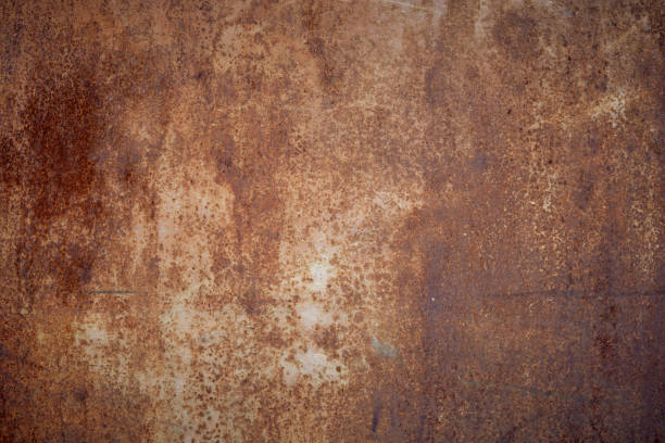 istock Beautiful abstract texture background from an iron sheet covered with corrosion and rust. 1492334719