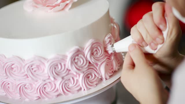 Cake decorating procedure.