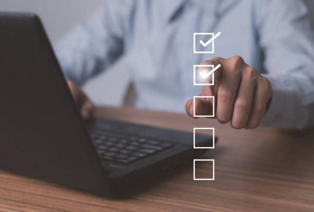 istock Businessman tick correct mark to approve document iso checklist icon.checkmark quality management quality assurance or QA and quality control or QC and improvement, Standardization and certification. 1492340202