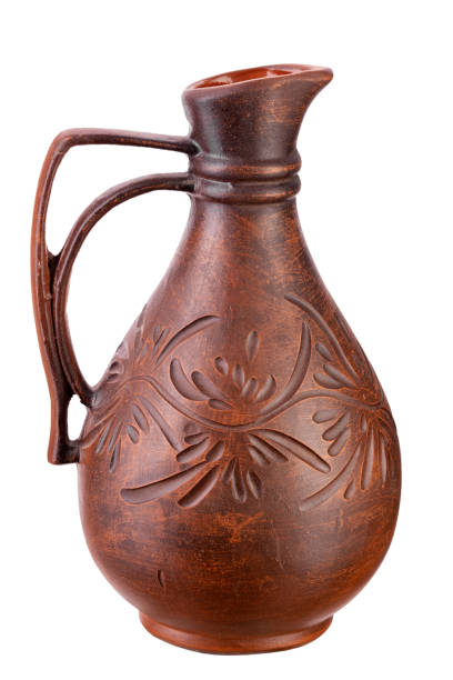 istock Clay jug with a narrow neck liquid for water or wine, isolated on white background. Full depth of field. 1492346232