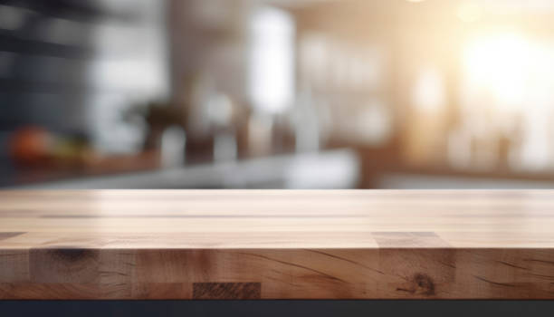 istock empty brown wooden table top and blurred defocused modern kitchen interior background 1492347625