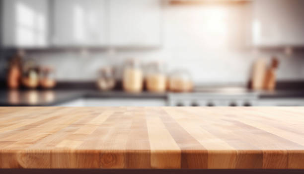 istock empty brown wooden table top and blurred defocused modern kitchen interior background 1492347630