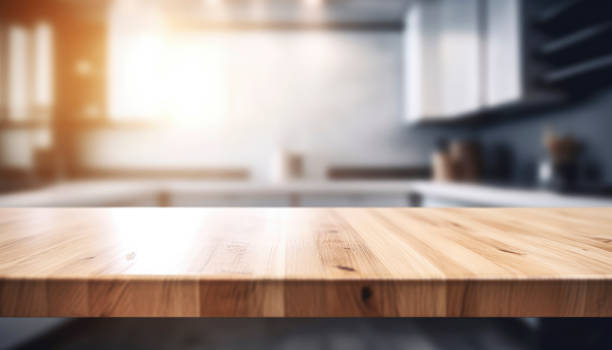 istock empty brown wooden table top and blurred defocused modern kitchen interior background 1492347637