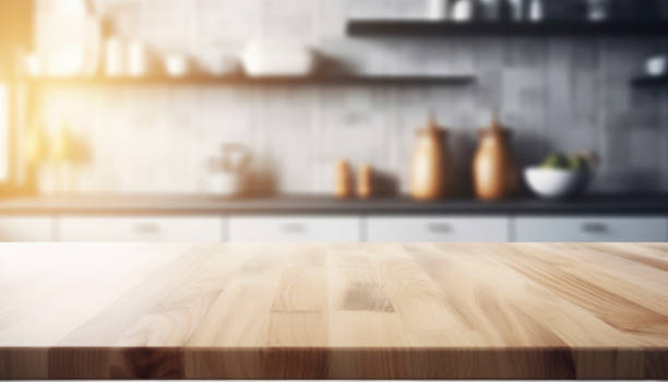 istock empty brown wooden table top and blurred defocused modern kitchen interior background 1492347640