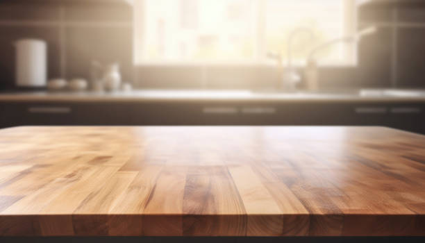 istock empty brown wooden table top and blurred defocused modern kitchen interior background 1492347644