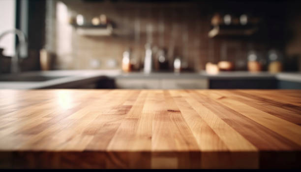 istock empty brown wooden table top and blurred defocused modern kitchen interior background 1492347650