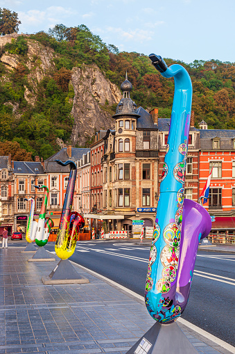 Giant saxophones painted by artists of different nationalities are lined on the bridge Charles de Gaulle in Dinant, Belgium, and are an homage to the European Union and to Antoine Joseph Sax, born in Dinant in 1814 and inventor of the musical instrument.