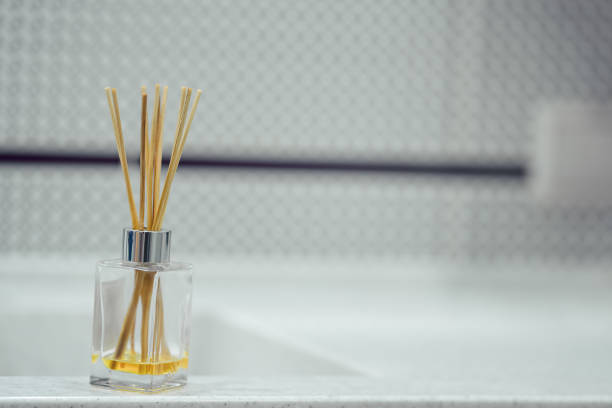 istock Handmade reed freshener located on commode in bathroom 1492357346