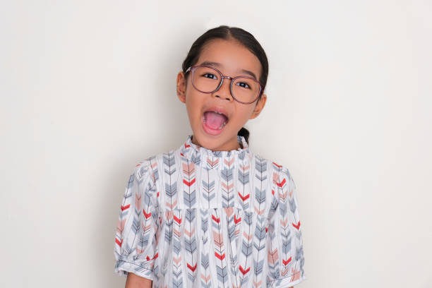 istock Asian little girl showing joyful expression 1492361876