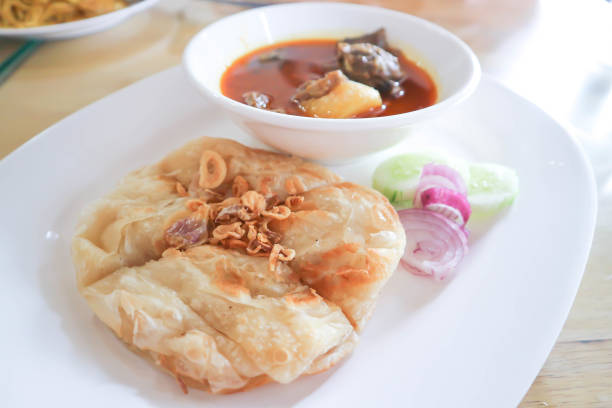 istock naan bread or roti with curry soup or beef stewed 1492366493