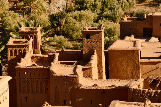 historic site,Ksar of Ait Ben Haddou, Oarzazate, Draa Tafilalet province, Morocco The fortified city, or Ksar, of Ait-Ben-Haddou is one of the 9 sites in Morocco that UNESCO has declared a World Heritage Site. This beautiful Ksar is located along the trade route that the caravans traveled through the Sahara desert from Sudan to Marrakech and as well as being a prime example of the ancient architecture of southern Morocco, it is a destination to absolutely include in your itinerary in Morocco. ait benhaddou stock pictures, royalty-free photos & images