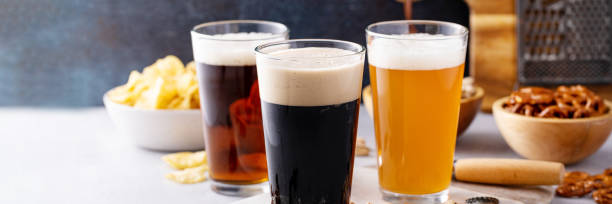 istock Variety of beer with snacks on the table 1492374071