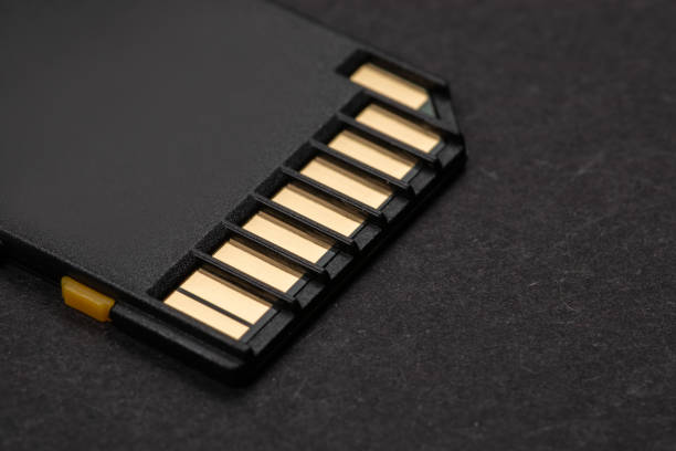 istock sd card lies on a dark background. close-up 1492374445