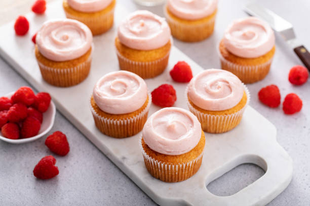 istock Raspberry cupcakes with a swirl of frosting 1492375144