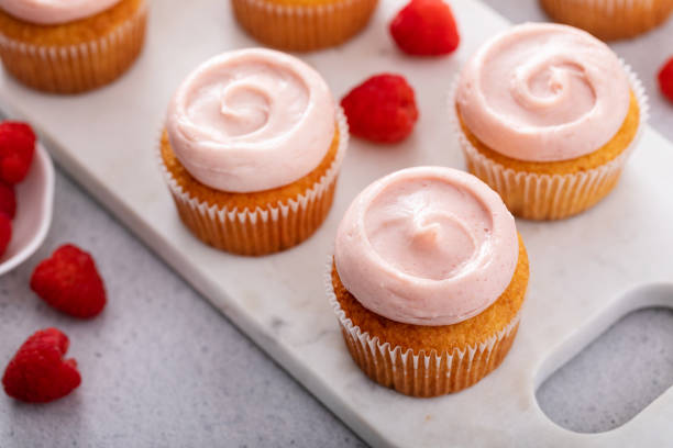 istock Raspberry cupcakes with a swirl of frosting 1492375147