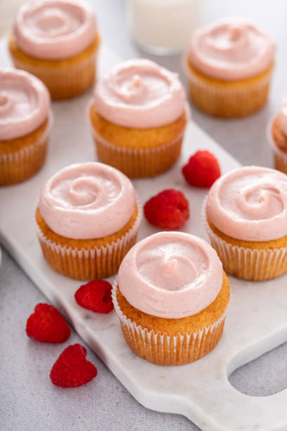 istock Raspberry cupcakes with a swirl of frosting 1492375148