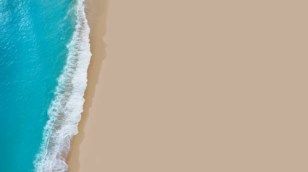 istock Tropical beach turquoise clear water and clear sand aerial drone view 1492376013