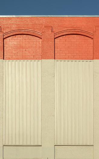 Windowless wall on orange and brown