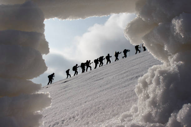 view of people walking in harmony from the snow window
