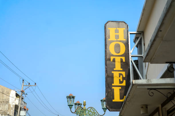 istock Old hotel sign with clear blue sky 1492386036