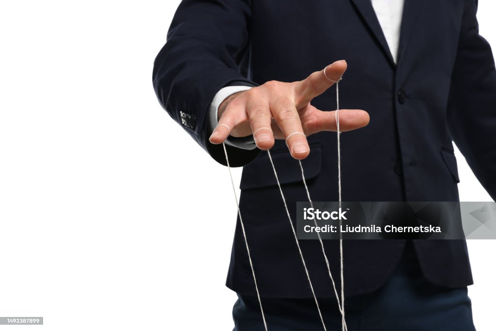 Man Stringed Puppet Man In Suit Pulling Strings Of Puppet On White Background Closeup Stock ...