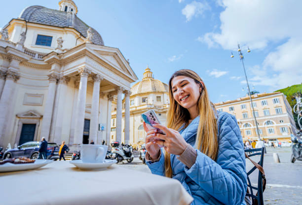 istock Woman drinking coffee on Piazza del Popolo, Rome 1492387946