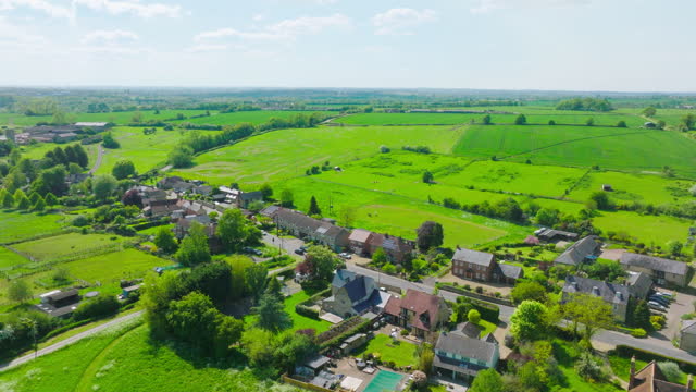 Drone view of houses and streets in a residential area UK