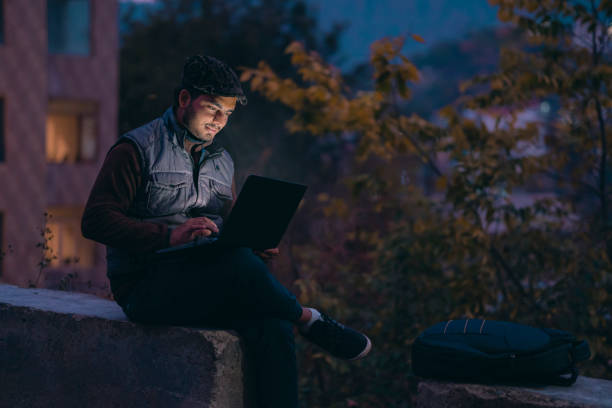 istock Busy businessman uses laptop while commuting. 1492391974