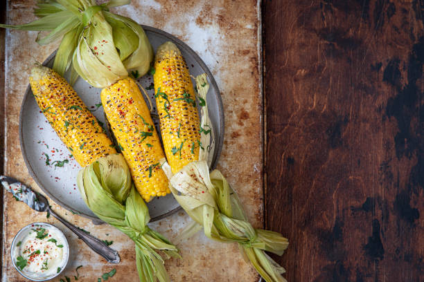istock Grilled sweet corn with paprika, salt and cilantro. 1492392454