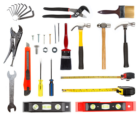 Assortment of tools isolated on plain background