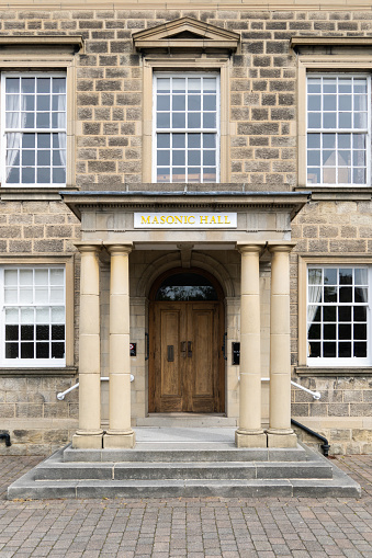 Harrogate, UK - May 14, 2023.  The doorway and entrance of the Masonic Hall in Harrogate which is owned by the Freemasons society