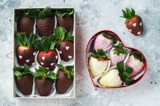 istock Gourmet chocolate covered strawberries on the light background. 1492399563