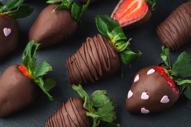 istock Gourmet chocolate covered strawberries on the dark background 1492399578