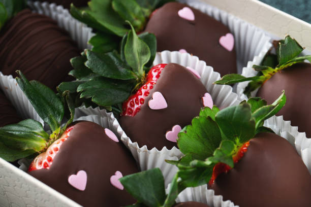 istock Gourmet chocolate covered strawberries on the dark background. 1492399582