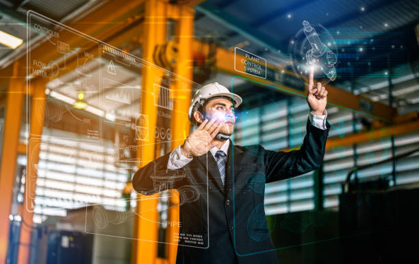 istock Businessmen and male engineers are thinking about methods and working in industrial plants for increased efficiency and safety.He is controlling and planning the rocket engine system in an industrial plant.Engineering concepts and architecture. 1492405142