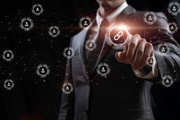 istock A man clicks the link icon in the network connecting users . 1492405381