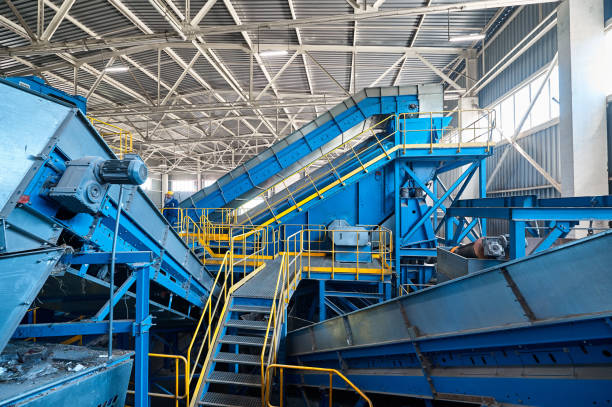 istock System of conveyors carrying trash at waste processing plant 1492409121