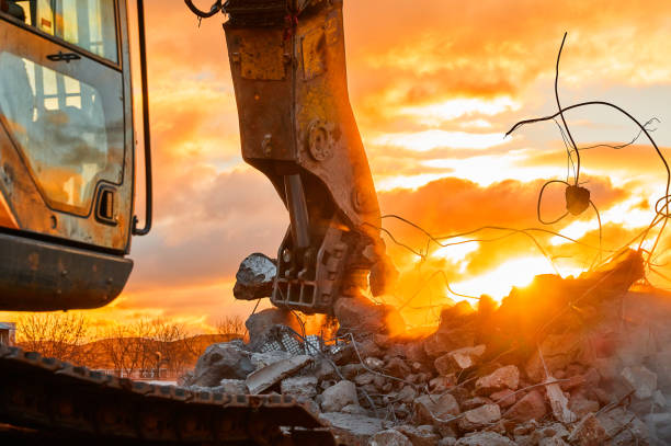 istock Metal crusher on excavator rigging destroys armored concrete 1492409265