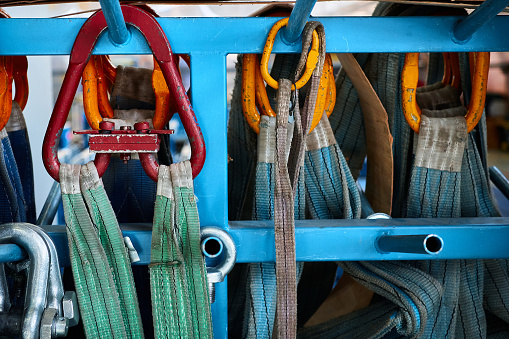 Quick Way Rigging Warehouse Rigging Equipment With Strops Hangs On Rack In Warehouse Stock Photo ...