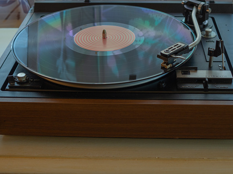 Close up of a dj  during a vinyl session