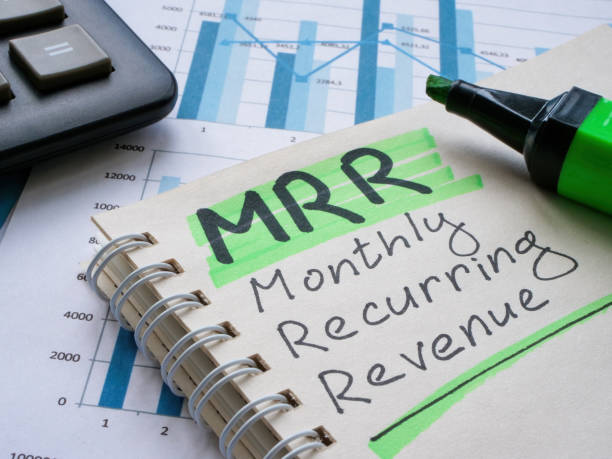 istock Page with marks about MRR Monthly Recurring Revenue. 1492416927