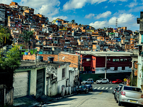 Slums of the world. favelas in Brazil. Aldeia de Joanes Street, Jardim Sao Luis neighborhood, West Zone of Sao Paulo, Brazil.