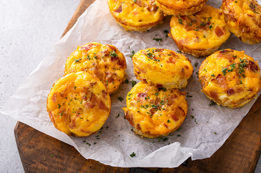 Breakfast egg muffins or egg bites with potato, bacon and cheddar