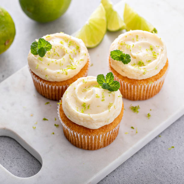 istock Mojito cupcakes with lime and coconut garnished with mint 1492419542