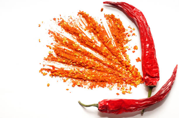 istock Red hot chili peppers and ground pepper 1492420572