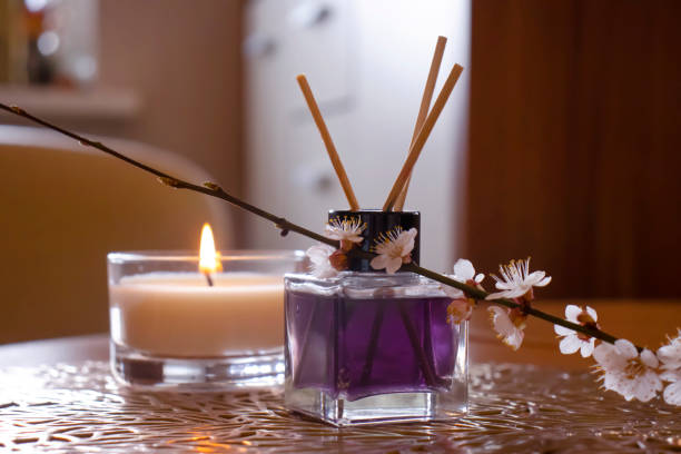 istock Candle, home perfume, flower background 1492420578