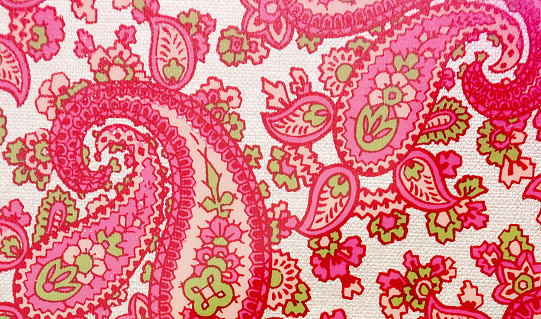 Brightly colored pink paisley.